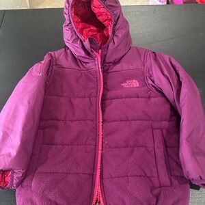 The North Face Magenta Hooded Jacket reversible .